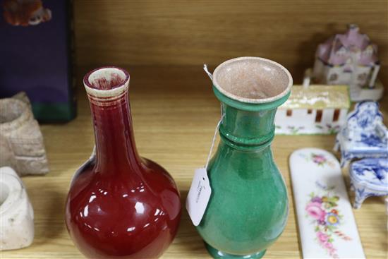 A Chinese sang de boeuf (langyao) vase and a Chinese green crackle glaze vase, 18th/19th century, Height 21cm